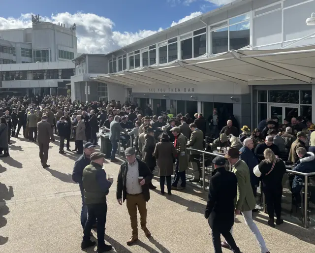 Racegoers at the Sew You Then bar