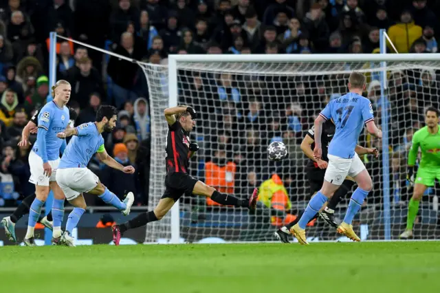 Ilkay Gundogan scores Manchester City's fourth goal against RB Leipzig