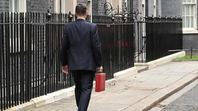 Jeremy Hunt walking away