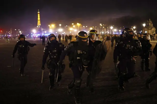 French police forces face protesters as clashes erupt on Place de la Concorde square, facing the French Parliament (National Assembly) in Paris, France, 16 March 2023