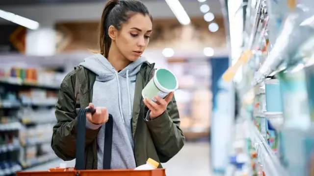 Woman in shopping aisle