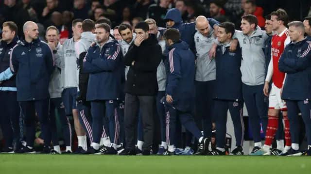 Arsenal's players and coaching staff