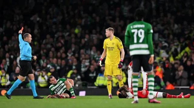 Manuel Ugarte is shown a red card