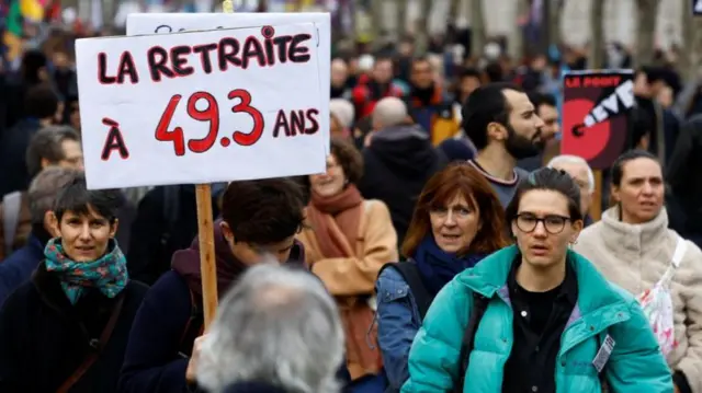 Protesters attend a demonstration against French government's pension reform plan in Paris, as part of the eighth day of national strike and protests in France, March 15, 2023.