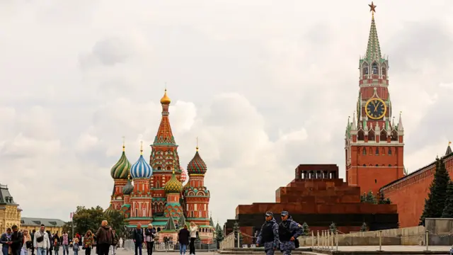 People walk across Russia's Red Square