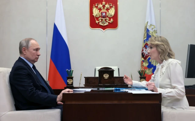 Maria Lvova-Belova with Vladimir Putin