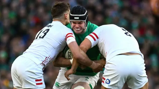 Henry Slade and Jamie George tackle James Ryan