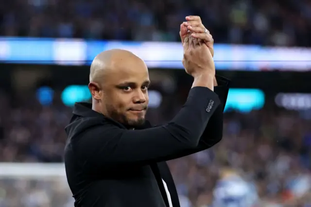 Vincent Kompany applauds supporters on his return to Man City with Burnley