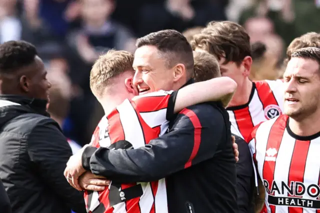 Match-winner Tommy Doyle celebrates with Sheffield United manager Paul Heckingbottom