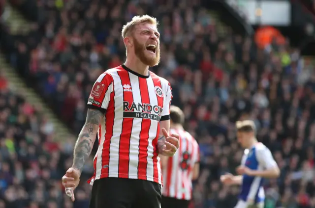 Oli McBurnie celebrates scoring Sheffield United's second goal to make it 2-2 against Blackburn