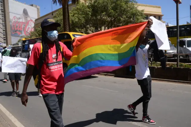 Kenya protesters with pride flag