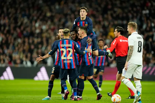 Barcelona players celebrate the opener