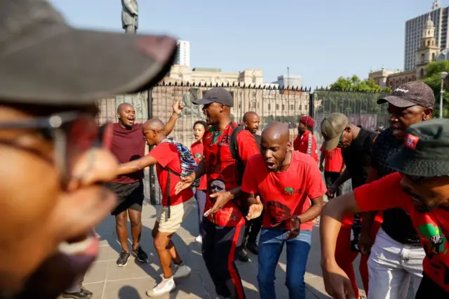 Members of the the Economic Freedom Fighters (EFF) gather at Church Square in Pretoria on March 20, 2023 during a "national shut-down" called by their party to bring the country to a halt