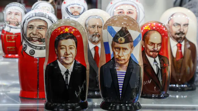 Russian matryoshka dolls with portraits of the Chinese President Xi Jinping and Russian President Vladimir Putin sold on a street souvenir shop in downtown Moscow,