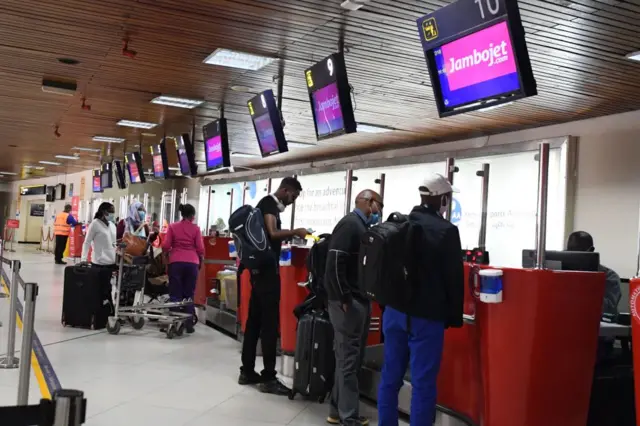 Passengers check in at the Jomo Kenyatta International Airport