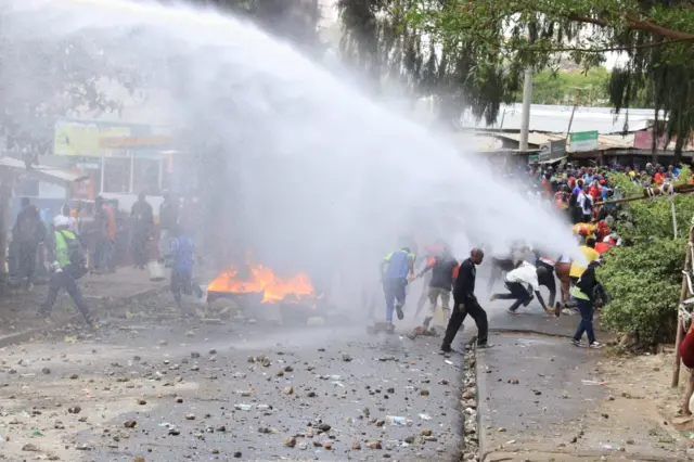 Police use water canon against protesters