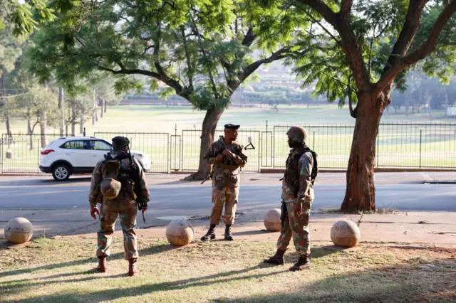 Members of the South African National Defence Forces (SANDF) are seen at the south lawns of the Union Buildings in Pretoria on March 20, 2023