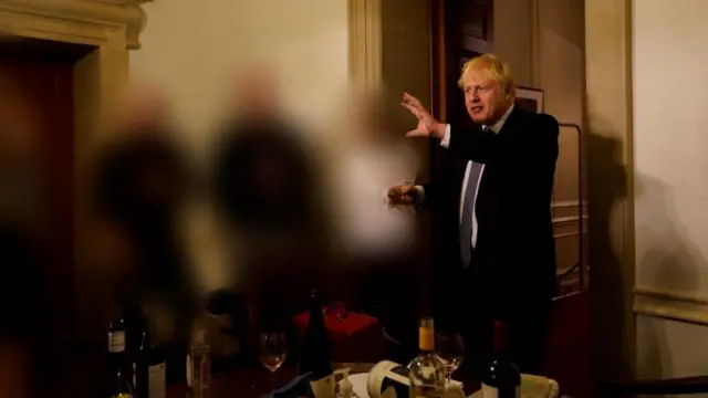 Handout file photo dated 13/11/20 issued by the Cabinet Office showing the then prime minister Boris Johnson at a gathering in 10 Downing Street for the departure of a special adviser, which was released with the publication of Sue's Gray report into Downing Street parties in Whitehall during the coronavirus lockdown