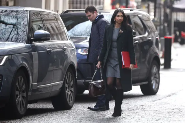 Suella Braverman walks along Downing Street