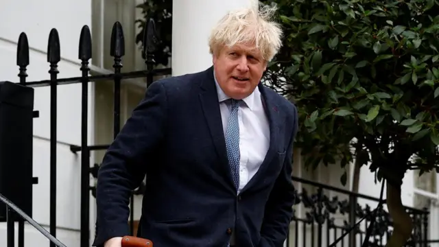 Former British Prime Minister Boris Johnson leaves his home, in London, Britain March 21, 2023.