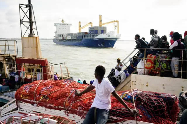 Passengers in a ferry from Banjul