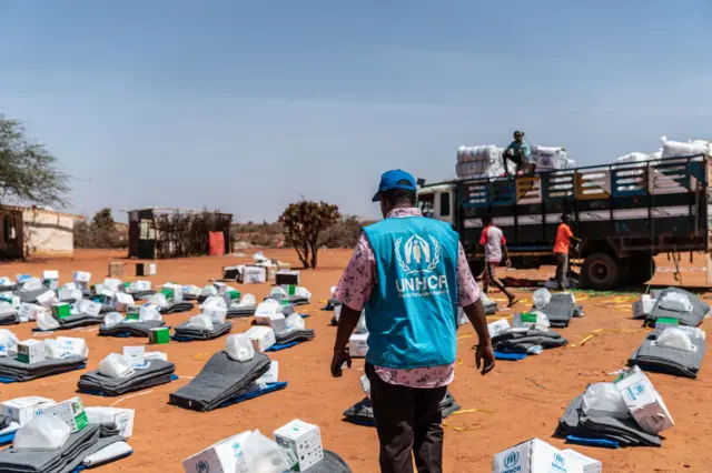 UN Aid worker organising kits in Somalia