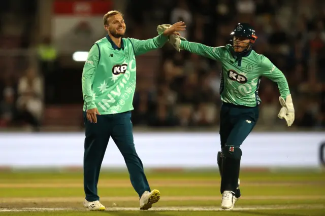 Danny Briggs celebrates a wicket with Oval Invincibles captain Sam Billings in the 2022 Hundred