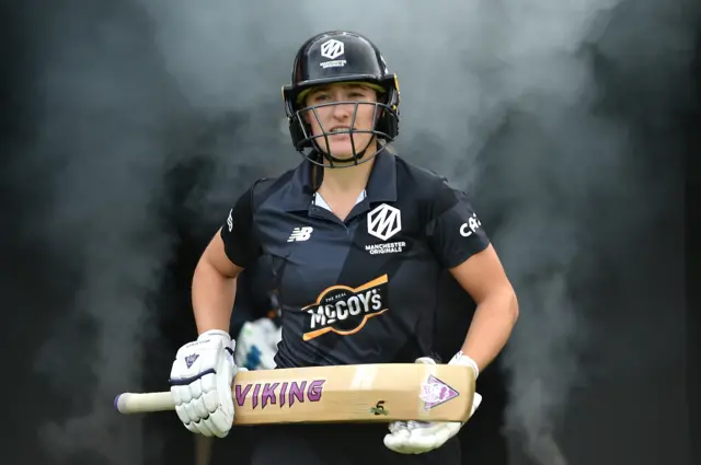 Emma Lamb of Manchester Originals walks out to the middle in the 2022 Hundred