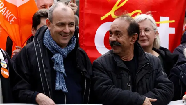 Laurent Berger, secretary general of French Democratic Confederation of Labour (CFDT) and CGT labour union leader Philippe Martinez attend a demonstration as part of the ninth day of nationwide strikes