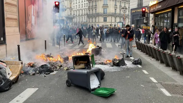 Bin on fire near Opera Square