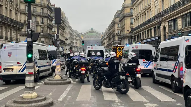 Police on motorbikes on Boulevard de l’Opera in Paris