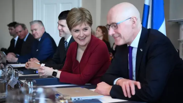 Ms Sturgeon was flanked by John Swinney, who will also quit the government next week, in her final cabinet meeting