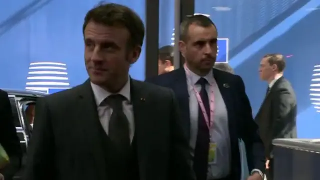 The French president arriving in Brussels