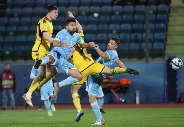 Northern Ireland's Paddy McNair wins a header