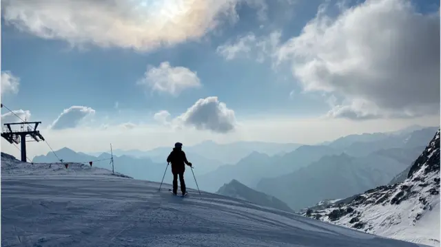 Skier at top of mountain