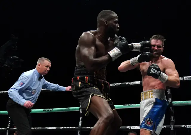 Lawrence Okolie lands a left hand on David Light