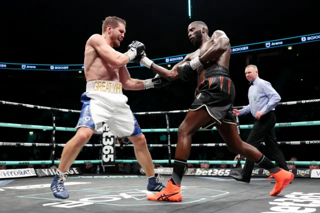 Lawrence Okolie throws an uppercut