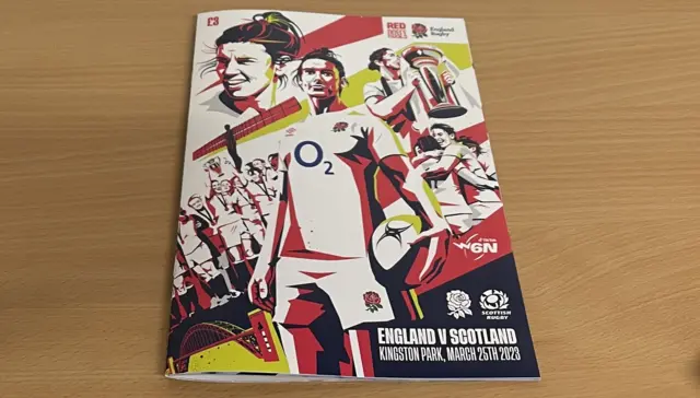 A match day programme with a picture of Sarah Hunter