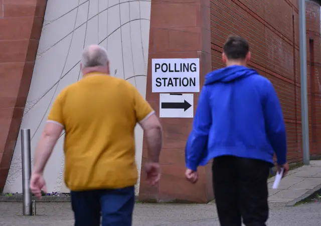 People heading to polling station