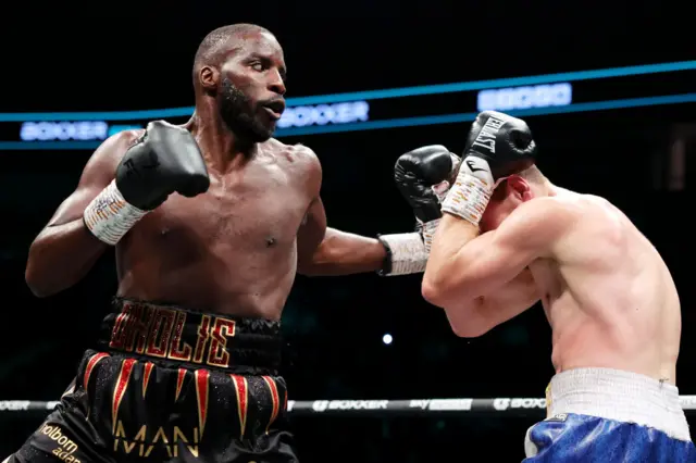 Lawrence Okolie aims a hook at David Light