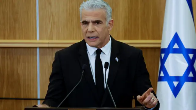 File photo showing Yair Lapid speaking at the Israeli parliament in Jerusalem (13 February 2023)