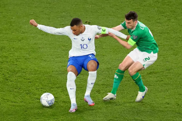 Kylian Mbappé in action against Seamus Coleman