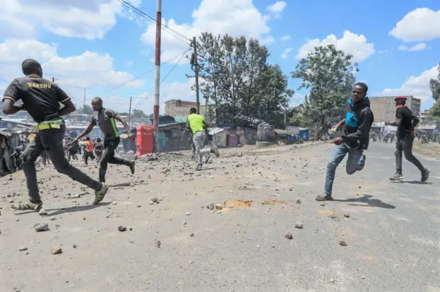 People running during protests