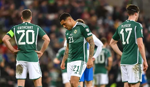 Northern Ireland players dejected at full time