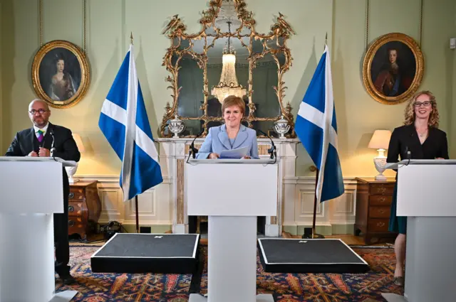 Nicola Sturgeon is flanked by Scottish Greens co-leaders Patrick Harvie (left) and Lorna Slater (right)