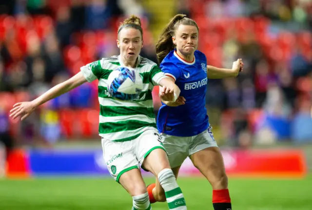 Kirsty Howat tussles for possession