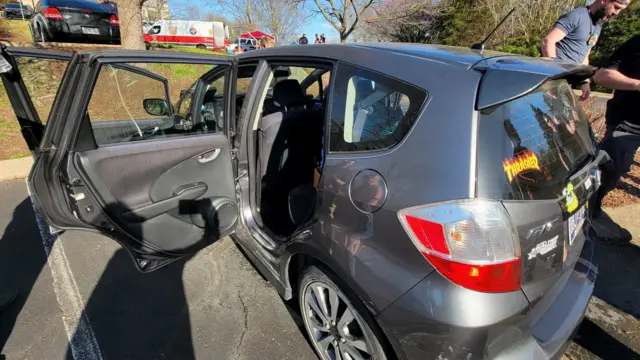 A photograph distributed by the Metropolitan Nashville Police Department shows what they describe as the Honda Fit vehicle, driven and parked at The Covenant School by mass shooting suspect Audrey Elizabeth Hale