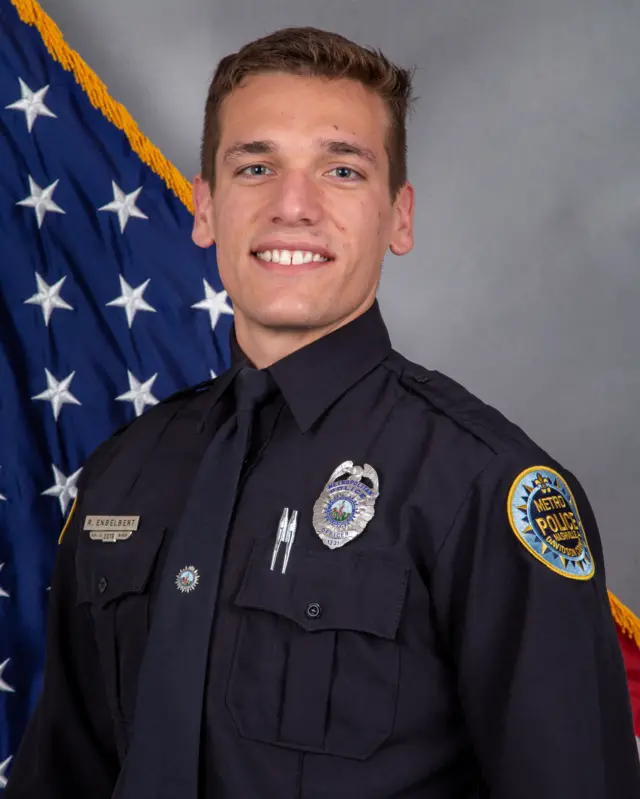 Photo of police officer who shot at armed suspect.