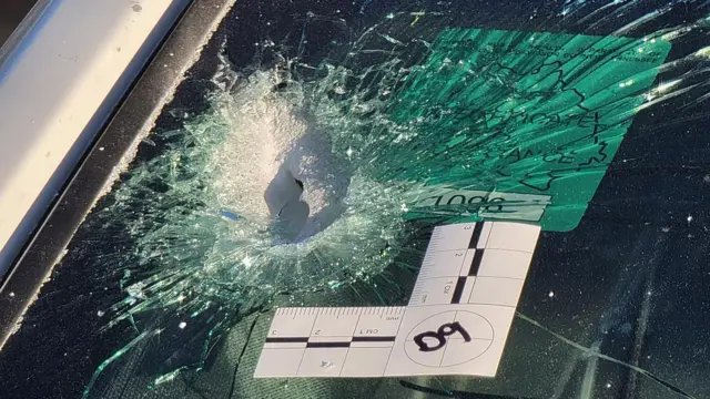 A handout photo made available by the Metro Nashville Police Department showing bullet hits in arriving police vehicles the alleged shooter they identify as Audrey Elizabeth Hale caused as Hale fired at police arriving to the scene at the Covenant School