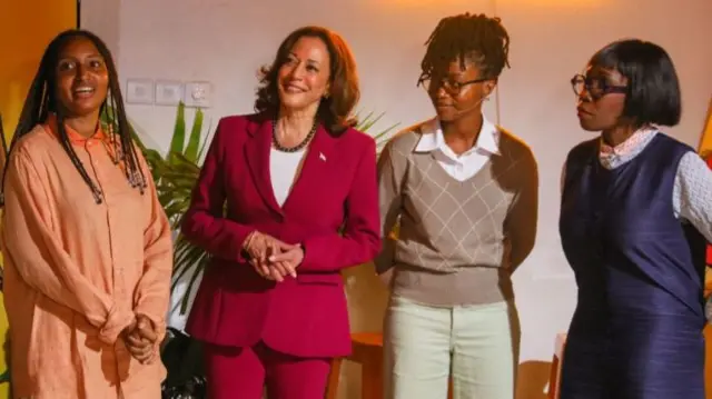 Kamala Harris visits a studio in Ghana.